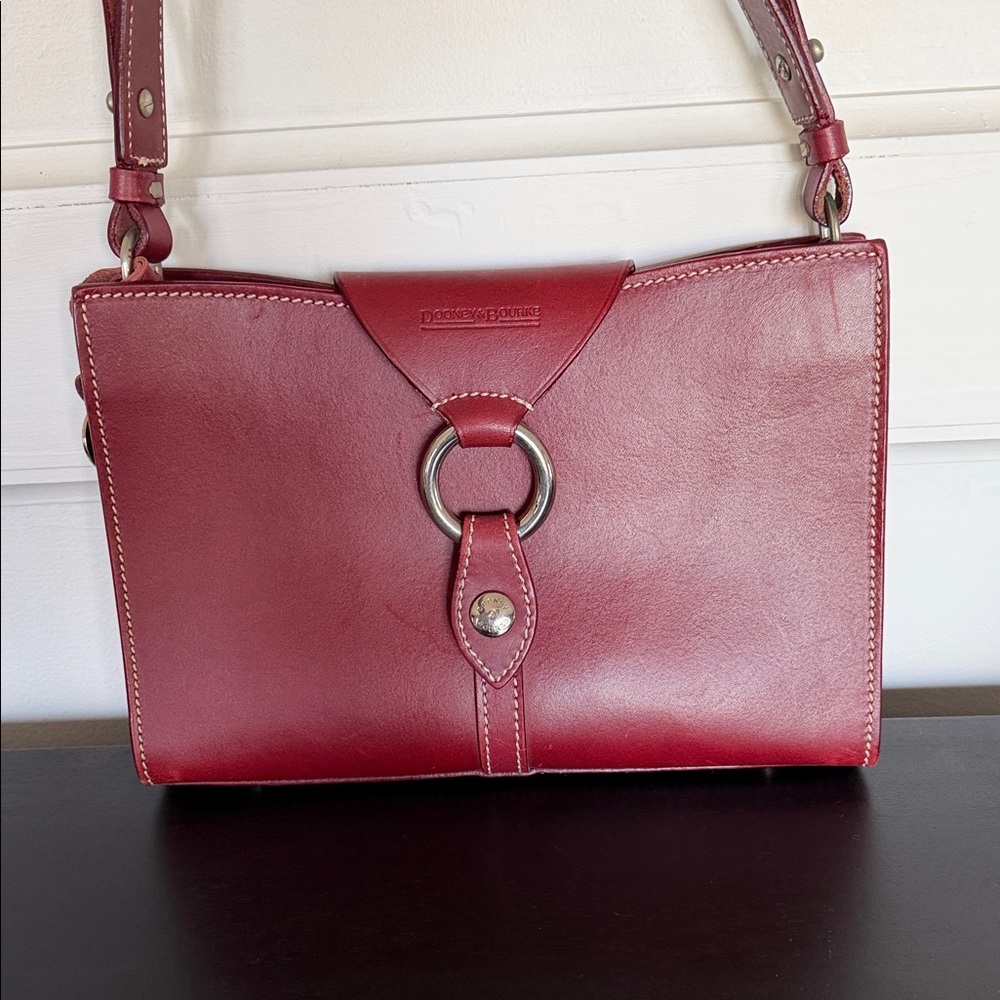 Dooney & Bourke Alto Ring Flap Italian Vachetta shoulder bag in red leather